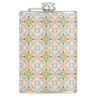 A metal flask with a colorful, symmetrical pattern heupfles