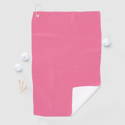 A pink towel with a subtle grid pattern golfhanddoek (Insitu)