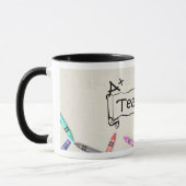 A+ Professeur avec la tasse de crayons (Gauche)