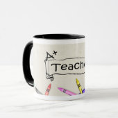 A+ Professeur avec la tasse de crayons (Devant gauche)