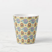 A tall white mug features a colorful pattern (Devant)