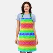 A vibrant, rainbow-patterned apron with green  schort (Gedragen)