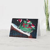 A whimsical holiday card with sledding dinosaurs kaart (Voorkant)