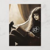 A witch reads with her black kitten briefkaart (Voorkant)
