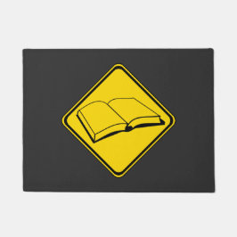 Aandachtboeken voorop deurmat