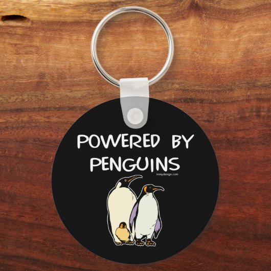 Aangedreven door pinguïns sleutelhanger (Achterkant)