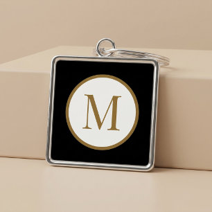 Aangepast zwart & goud middenzegel monogram sleutelhanger