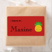 Aangepaste etiketten op Bright rode zoete anananas (Insitu)