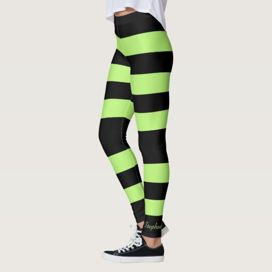 Aangepaste, heldere, groene en zwarte streep leggings (Links)