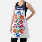 Aangepaste tekst roze en oranje folkloristisch sch schort (Insitu)