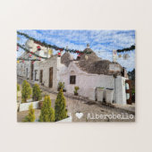 Aangepaste tekst, trulli-huizen in Alberobello Legpuzzel (Horizontaal)