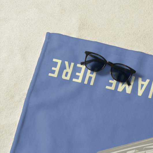 Aangepersonaliseerde handdoek met pontoon en tan (In situ)