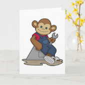 Aap als monteur met sleutel kaart (Gele Bloem)