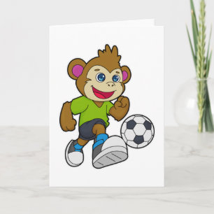 Aap als voetballer met voetbal kaart