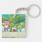 Aap en slak in een tropisch Oerwoud Sleutelhanger (Achterkant)