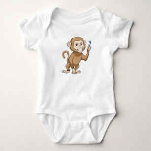 aap met tandenborstel romper