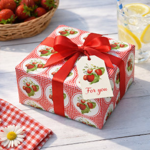 Aardbeien en rode geruite stof cadeaupapier