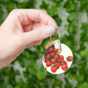 aardbeien in mandje, fruitbessen sleutelhanger