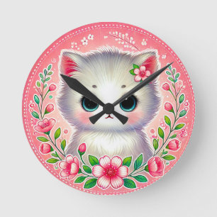 Aardige witte kitten omringd door roze bloemen ronde klok