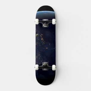 Aardse stad licht 's nachts op Azië en Australië Skateboard