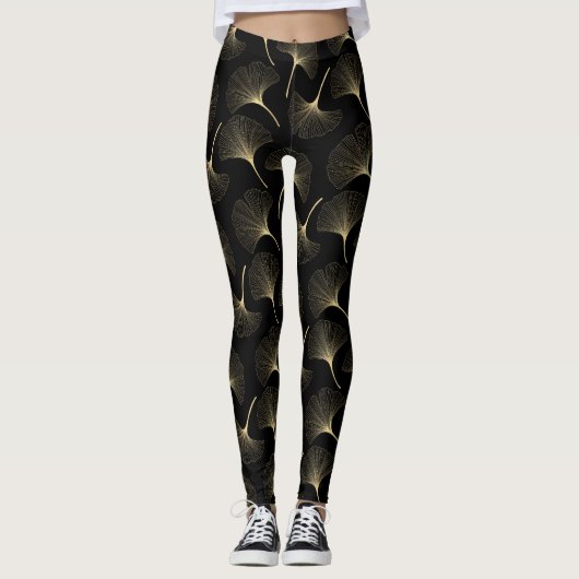 Abstract bladpatroon met zwart en licht goud leggings (Voorkant)