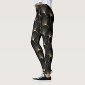 Abstract bladpatroon met zwart en licht goud leggings (Links)