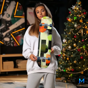 Abstract geometrisch met felle oranje en groene ti skateboard