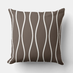 Abstract golvend geometrisch patroon op beige kussen