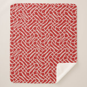 Abstract lijnpatroon van rood en crème sherpa deken