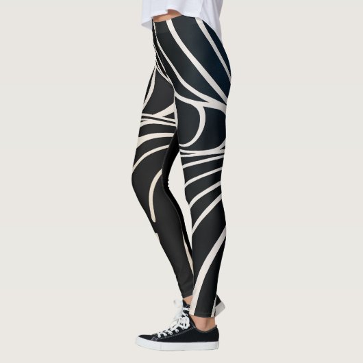 Abstract patroon met zwarte en witte golvende lijn leggings (Links)