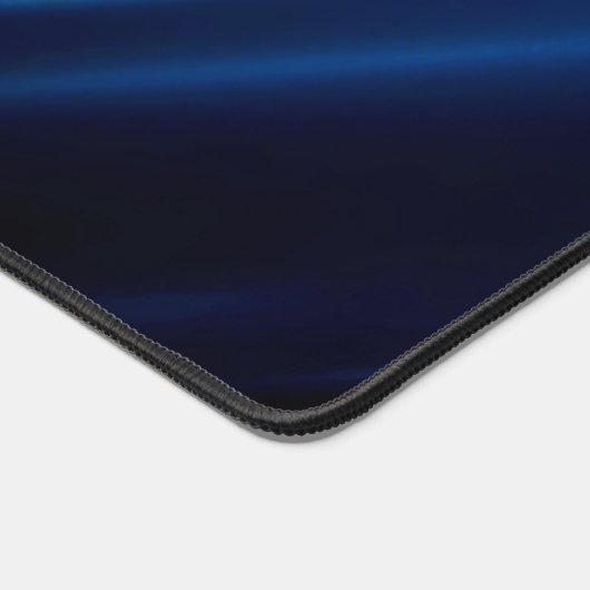 Abstracte blauwe lijnen op zwart bureaumat (Hoek)