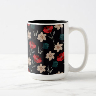 Abstracte bloemen op zwart tweekleurige koffiemok