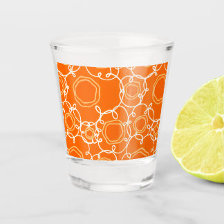 ABSTRACTE BLOEMMOTIEF IN ORANJE SHOT GLAS
