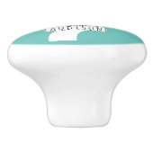 Abstracte cirkelboom en naam op licht blauwgroen keramische knop (Zijkant)