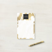 Abstracte Faux Gold-penseelstreken op wit Post-it® Notes (Op bureau)