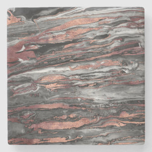 Abstracte gemarmerde verf met matig roos goudverf stenen onderzetter