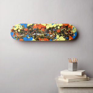 Abstracte gemorste verfspatten en -druppels skateboard