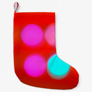 Abstracte kleur Blurred red background bokeh light Kleine Kerstsok