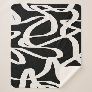 Abstracte lijnen met moderne zwarte en beige crèm sherpa deken