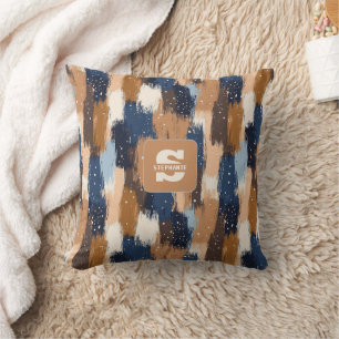 Abstracte penseelstreken in blauw, wit en bruin (2 kussen