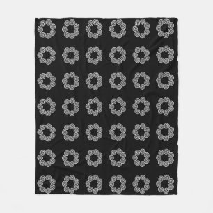 Abstracte spiraalcirkelpatroon op zwart fleece deken