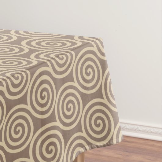 Abstracte spiraalcirkels op beige tafelkleed (Voorbeeld)