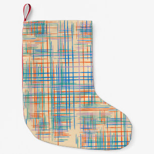 Abstracte strepen, kleurrijke etnische grasmat. kleine kerstsok