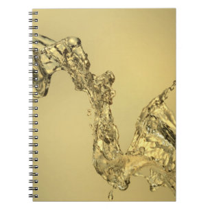 Abstracte vorm gevormd door aftappen van water notitieboek