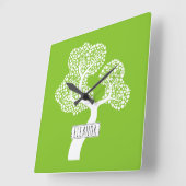 Abstracte witte cirkelboom en naam kalkgroen vierkante klok (Hoek)