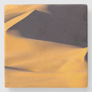 Abstracte zandduin stenen onderzetter
