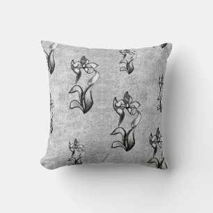 Abstracte zwarte neonbloemen op zilver kussen