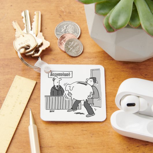 Accountant client met gigantische spaarbank sleutelhanger (Bureau)