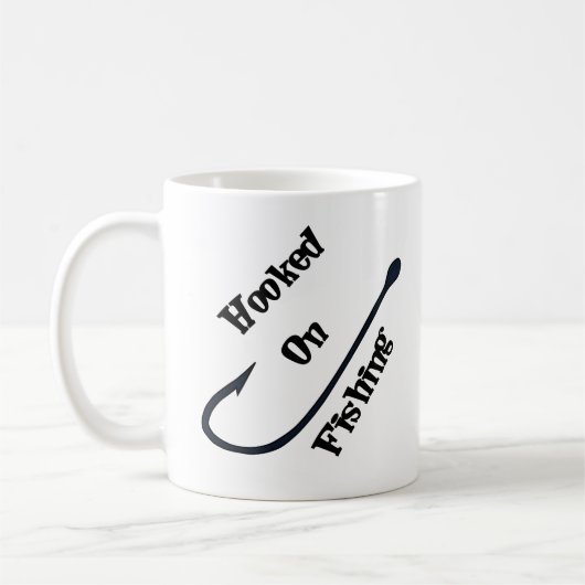 Accroché sur la pêche - tasse de café d'amusement (Gauche)