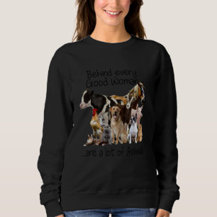 Achter elke goede vrouw zit een hoop dieren. trui